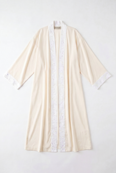 Cream-colored kimono-style robe with white embroidered trim along the front edges and cuffs, laid flat