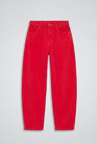 Red corduroy pants laid flat, front view with belt loops and button at waistband